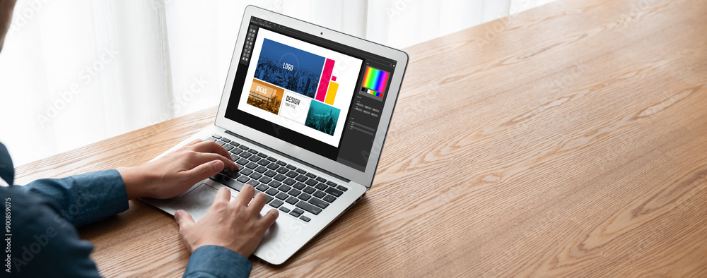 Poster graphic designer software for modern design of web page and commercial ads showing on the computer s