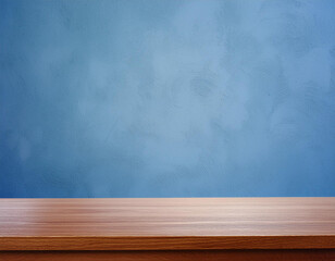 Simple mockup featuring a blue wall texture and wooden surface, perfect for showcasing products.