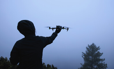 Flying drone in high altitude mountains