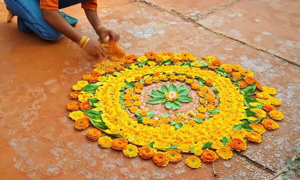 Flower Rangoli Designer Specializing in Marigold and Mango Leaves