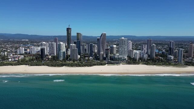 Gold Coast Surfers Paradise skyline at Broadbeach with waves breaking over shore