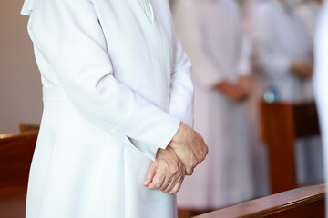 Obraz premium Close-up of child hold candle in hand and waiting