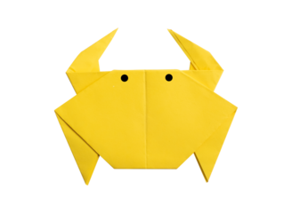 yellow paper crab origami isolated on a blank white background