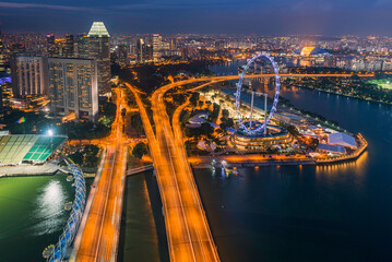 Obraz premium Singapore city, sunset and sunrise Downtown of Singapore is office buildings and business bank financial