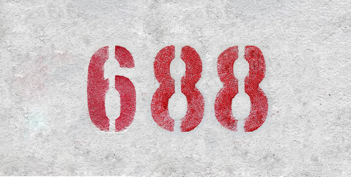 Red Number 688 on the white wall. Spray paint.
