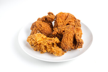 Crispy Fried chicken on a white plate isolated on white background. Perfect for recipes, articles or any cooking content.