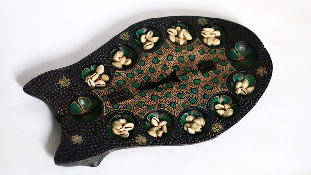 Congklak or dakon. Traditional Indonesian game that is particularly popular among children.
