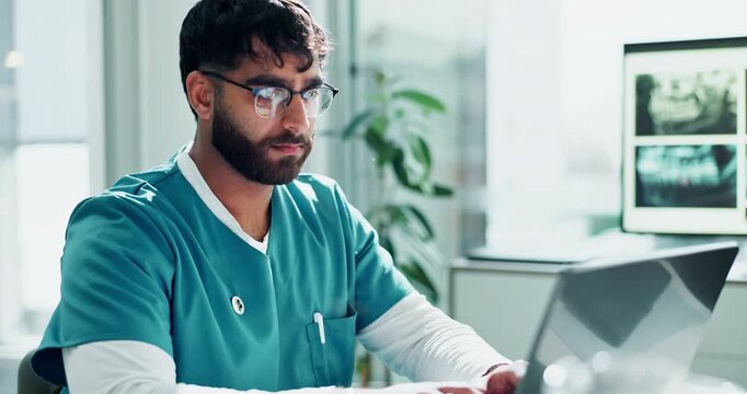 Man, medical intern with laptop in office, dental employee and typing online for research. Email, virtual patient and oral examination or diagnosis results for gum disease, internet and communication