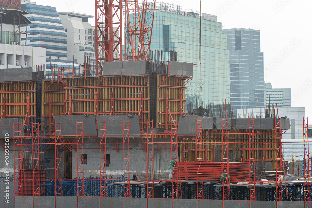 Wall mural construction site in city building with mechanical working group