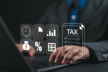 E-tax, Taxpayer using laptop filling out tax forms online for tax payment. State taxes, data analysis, paperwork, financial research, report VAT and property tax of business.