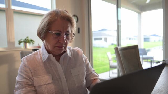 senior citizen asks herself why something could turn out that way after receiving an email from a friend