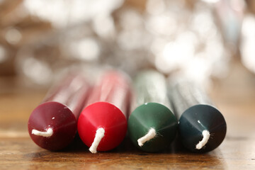 Christmas dinner candles on a table arranged in a gradient festive