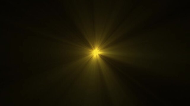 Loop of rays glow orange gold optical flare shine light from the top left animation,
 yellow light beams on black background. sun light lens flares art animation background.