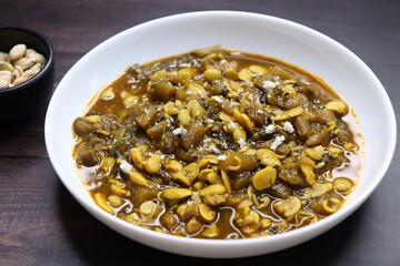 Aluche fatfate or alu wal chi patal bhaji is a traditional, authentic Maharashtrian dish. colocasia leaves and lima beans curry. It has a sweet and sour taste. Valachi aamti. Fadfade. Monsoon recipes.