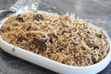  mutton biryani meal in a plate on table.