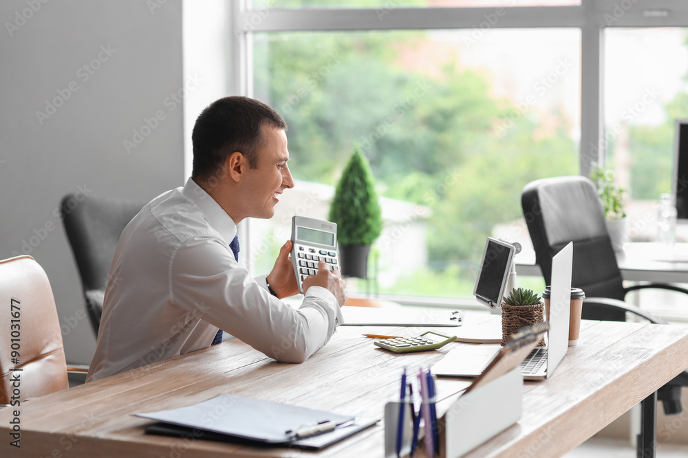 Poster Male accountant with calculator video chatting at desk in office