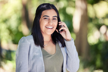 Business woman, phone call and portrait in park on walk with smile for contact, deal and good news. Person, happy and smartphone in nature for talk, networking and mobile connection in Colombia