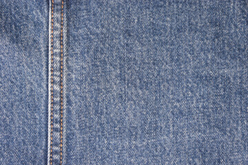 Naklejka premium seam of blue denim texture background, jean fashion style
