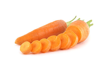 Whole carrot and its sliced pieces isolated against a white background