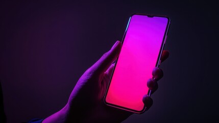 Close up Young man's hand holding mobile phone with empty screen against neon purple blue background,Male hand with smartphone. Blank white screen. Mock-up Red and blue neon light in dark black room.