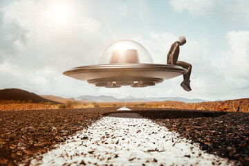 Alien sitting on a flying saucer © OSORIOartist