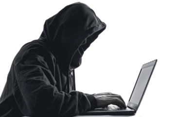 A hacker in black hoodie is working on his laptop.