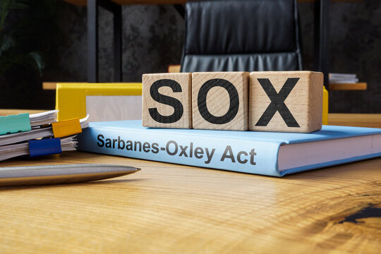 Cubes and book about SOX Sarbanes-Oxley Act.