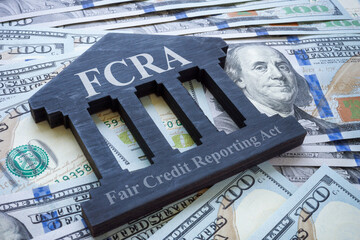 Money and plate FCRA Fair credit reporting act.
