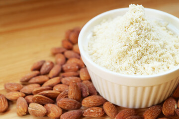 Bowl of almond flour, finely ground almonds for gluten free baking ingredient