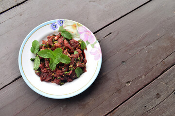 fresh salad on a wooden table