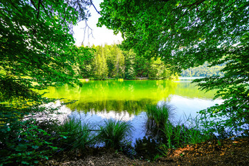 Landscape at Hechtsee near Kufstein. Clear mountain lake in Tyrol, Austria. Idyllic lake with the...