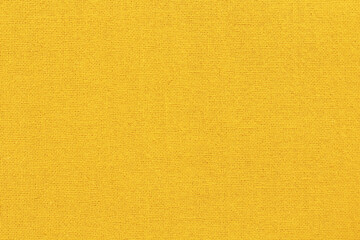 Yellow gold cotton fabric cloth texture for background, natural textile pattern.