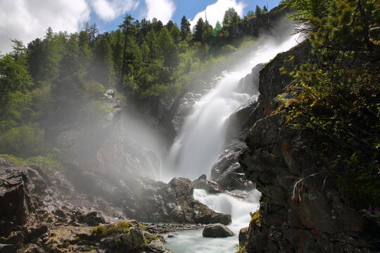 The impressive Rutor waterfalls overlooking the valley towards La Thuile in Italy, Aosta Valley