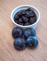 Plums are among the favorite fruits.They contain a large amount of potassium,which has a positive effect on blood pressure.Prunes are a great source of fiber, which is important for healthy digestion.