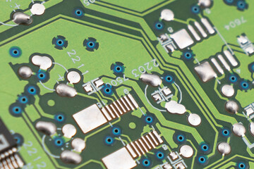 Circuit board with resistors microchips and electronic components background. Computer hardware...