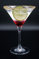 Alcoholic cocktail in a martini glass.