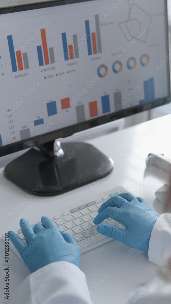 Poster A scientist in the laboratory utilizes technology to analyze data by creating charts, graphs, and employing statistics, thereby improving research processes using scientific tools and methods