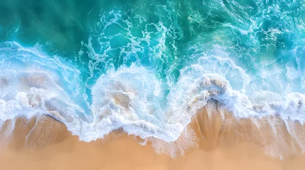 Gardinen  A stunning aerial view of turquoise waves crashing onto a sandy beach, capturing the beauty and serenity of the ocean. © Gita