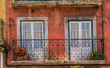 Old windows typical of Portuguese colonial buildings