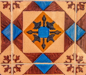 Detail of the traditional tiles from facade of old house. Decorative tiles.Portuguese traditional tiles.