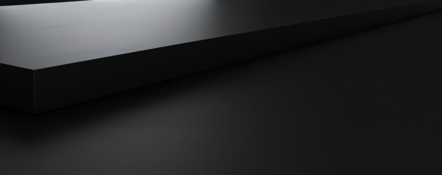A minimalistic black background with a smooth, matte finish, ideal for a sleek and contemporary design.