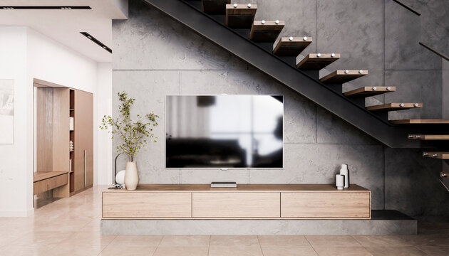 Television set under steps in modern living room