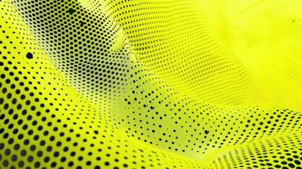 A yellow fabric with a pattern of dots. The dots are arranged in a way that creates a sense of movement and energy. The fabric is used as a background for a person, who is standing in the foreground