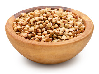 Wooden bowl of raw buckwheat on white background. File contains clipping path.