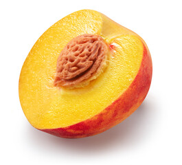 Ripe juicy peach half or peach cross section with stone isolated on white background. File contains clipping path.