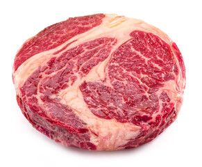 Raw ribeye steak isolated on white background.
