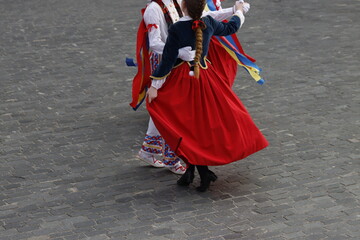  Basque folk dance couple in an outdoor event