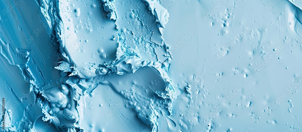 Poster Blue color in a creamy texture on a trendy cosmetic background with selective focus for a macro copy space image