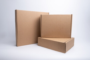 Brown paper box. Cardboard box isolated on white background. Place for text. Gift box