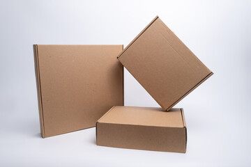 Brown paper box. Cardboard box isolated on white background. Place for text. Gift box